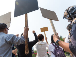 An image of men and women on strike.